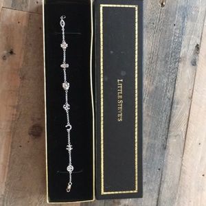 Little Steve’s silver charm bracelet